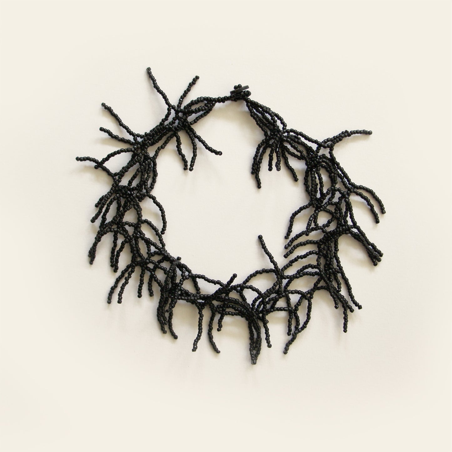 Handmade black seed bead necklace with coral-like layered strands