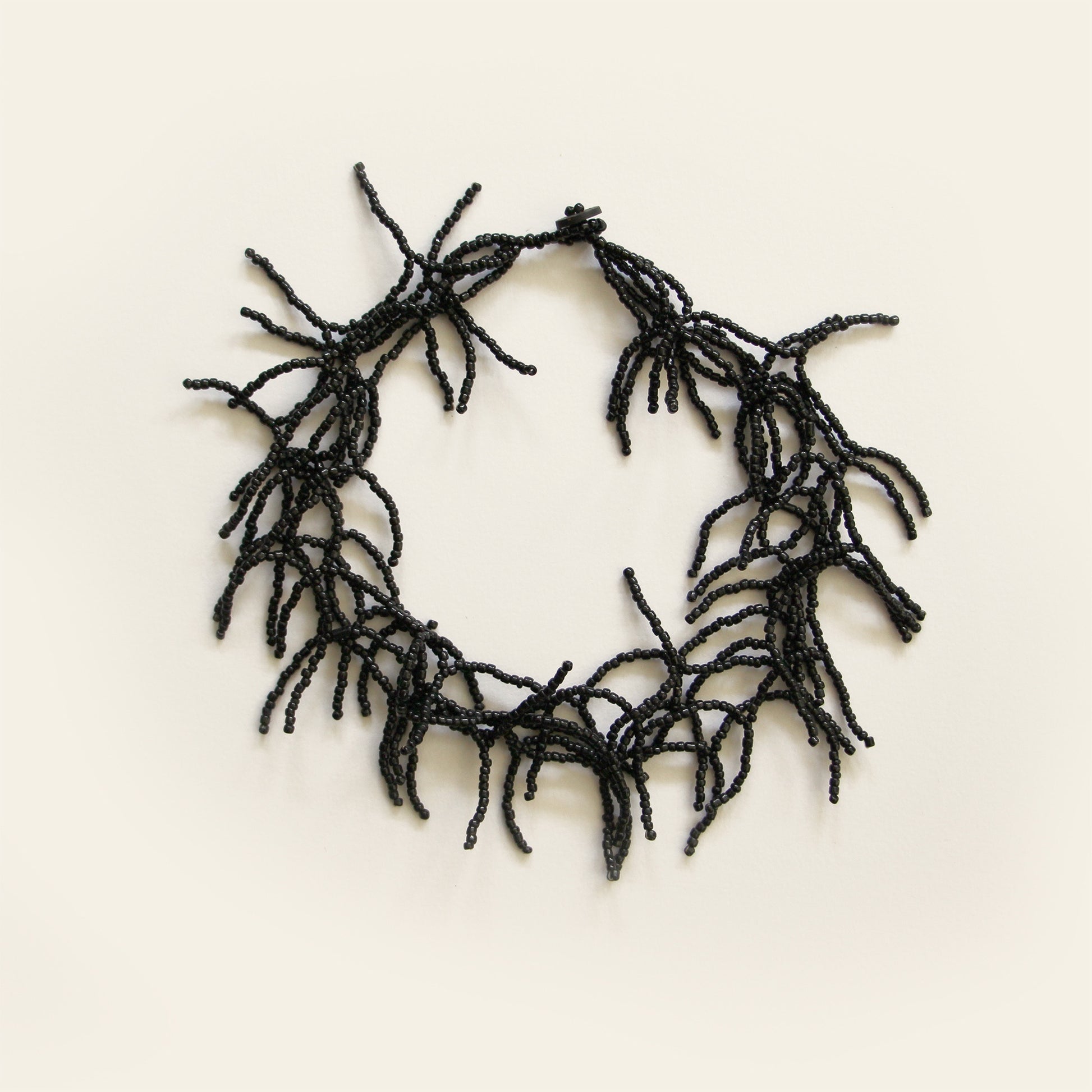 Handmade black seed bead necklace with coral-like layered strands