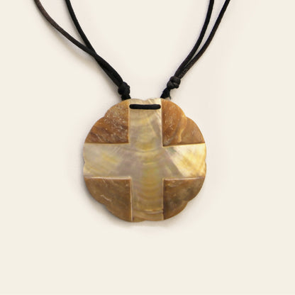 Closeup of handmade mother of pearl pendant necklace with black cotton cord – Nayabijou