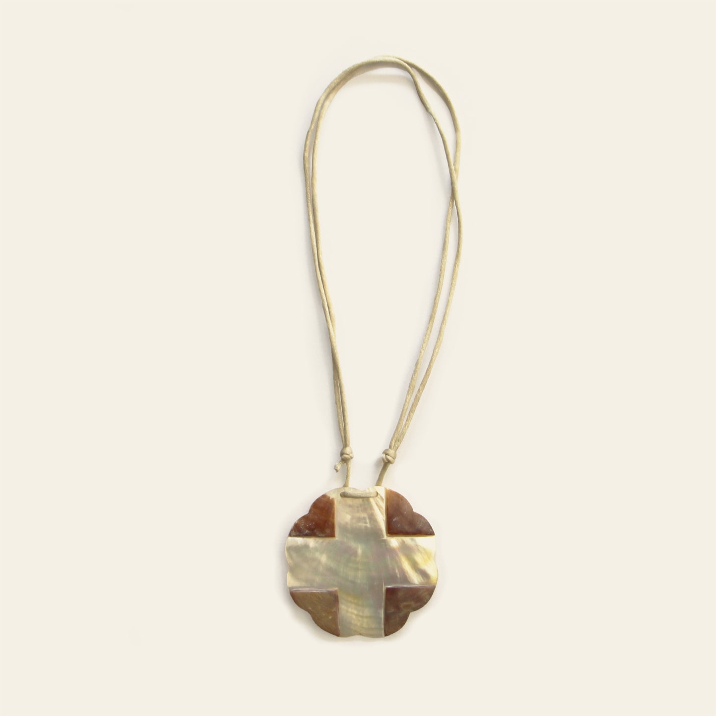 Light-toned mother of pearl pendant necklace with beige cotton cord – Nayabijou.