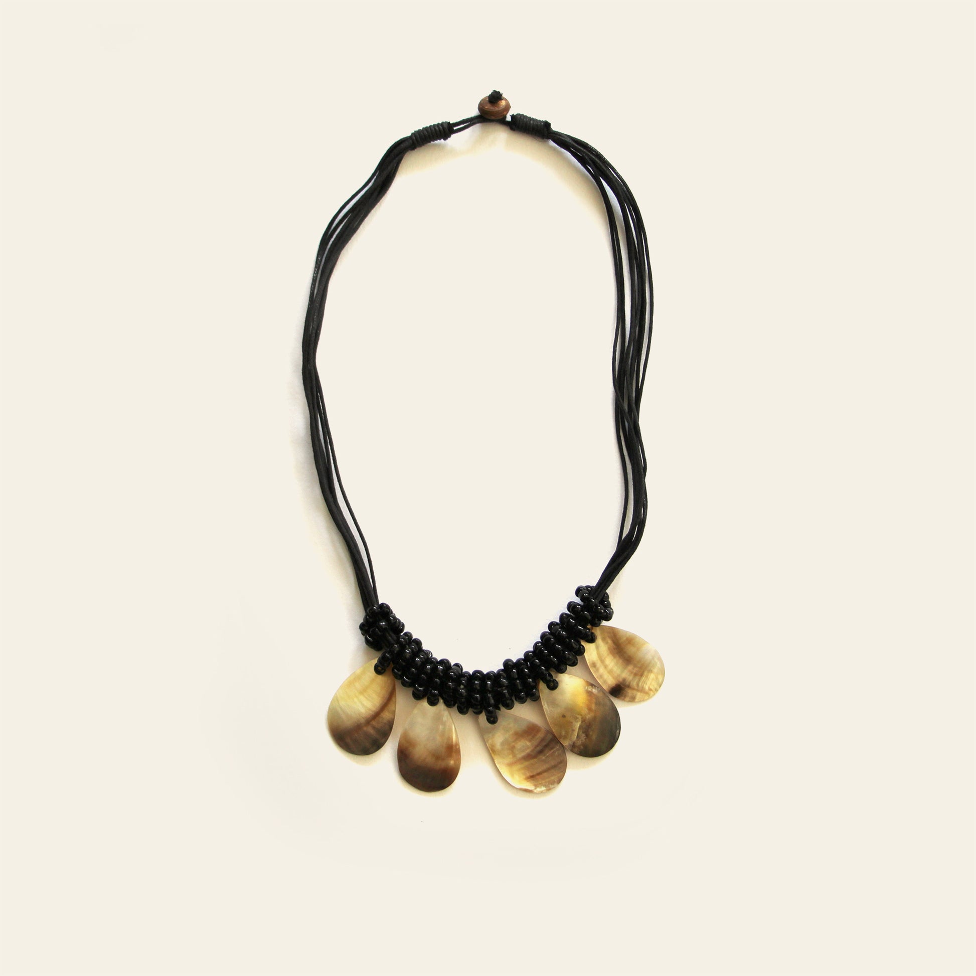 Black teardrop shell necklace with multi-cord detail and handcrafted finish- Nayabijou