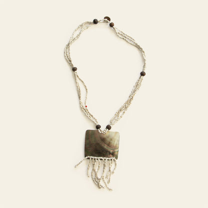 Full view of rectangular mother-of-pearl pendant necklace with ivory beads and beaded fringe – Nayabijou.